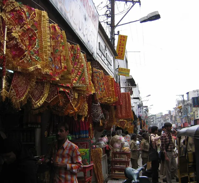 Shopfronts crowded with bridal wear along Laad Bazaar in Hyderabad